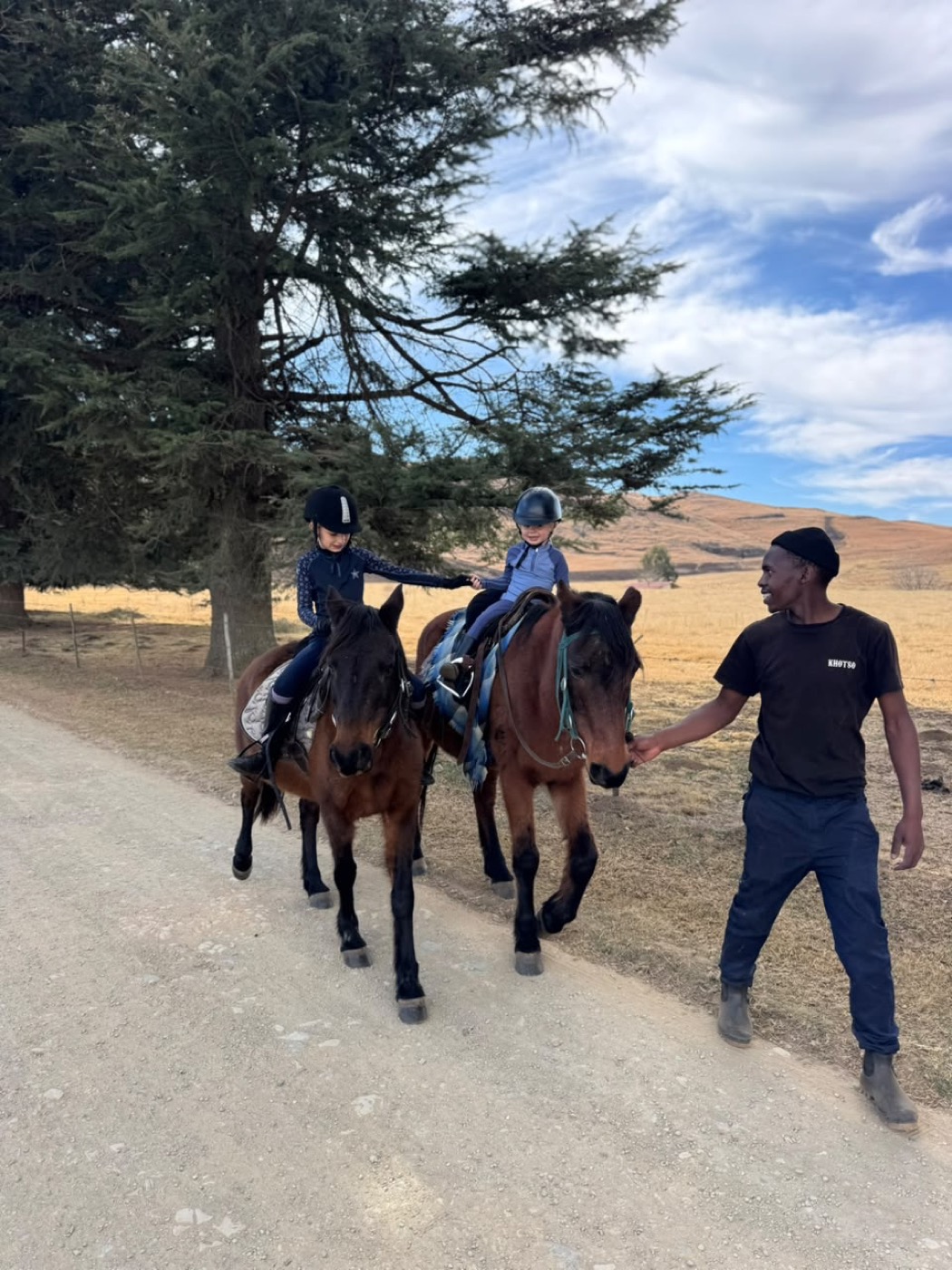 Young riders led on horseback at Khotso Horse Trails