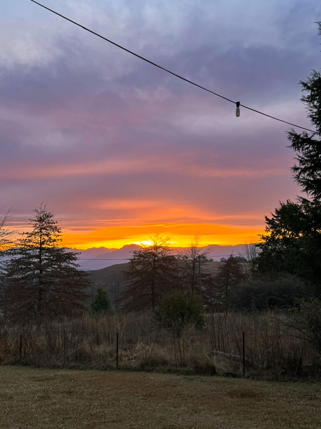 Winter sunset over the Drakensberg from the Oakhaven garden
