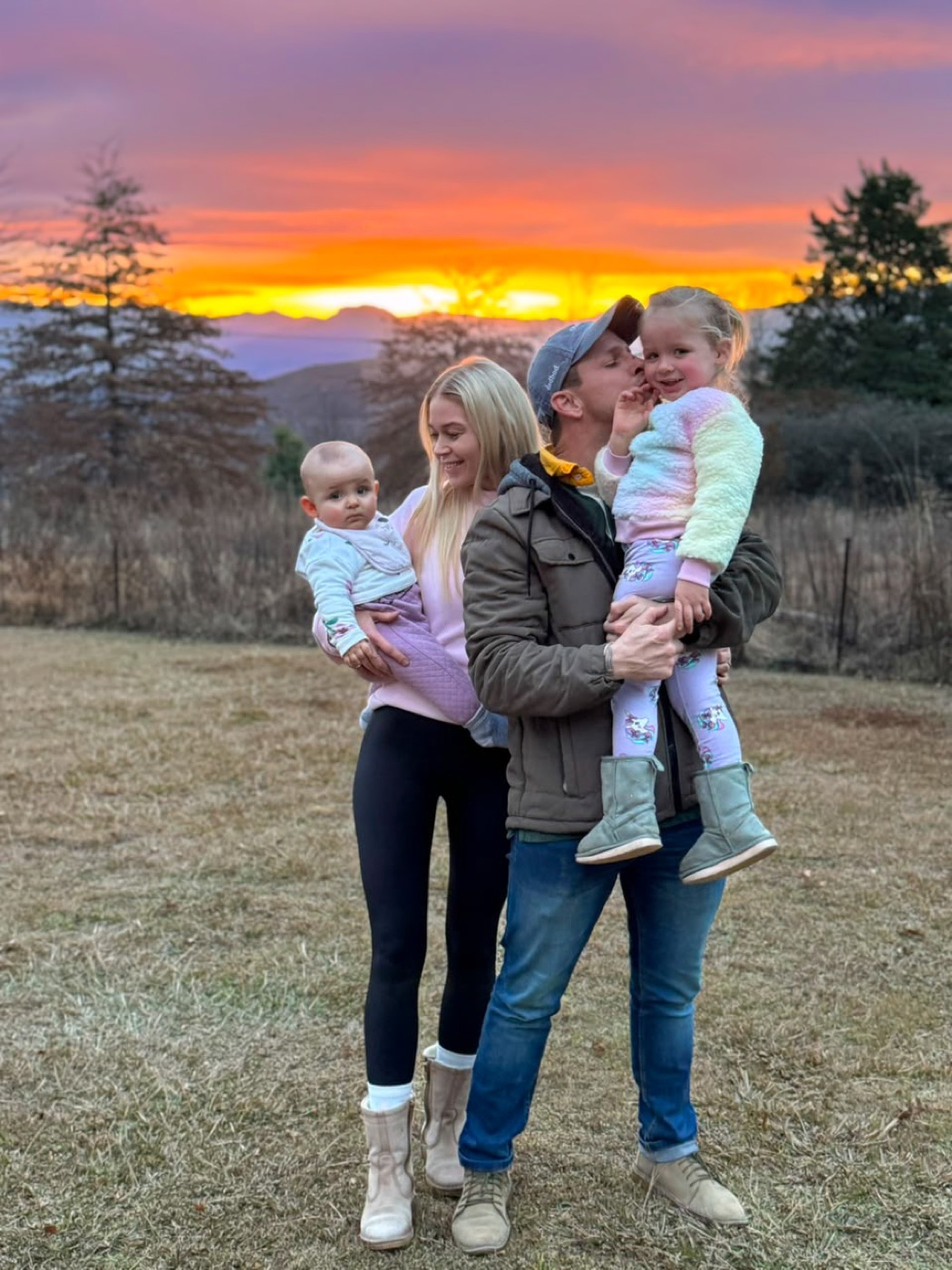 Family sunset in the Oakhaven garden, Drakensberg behind