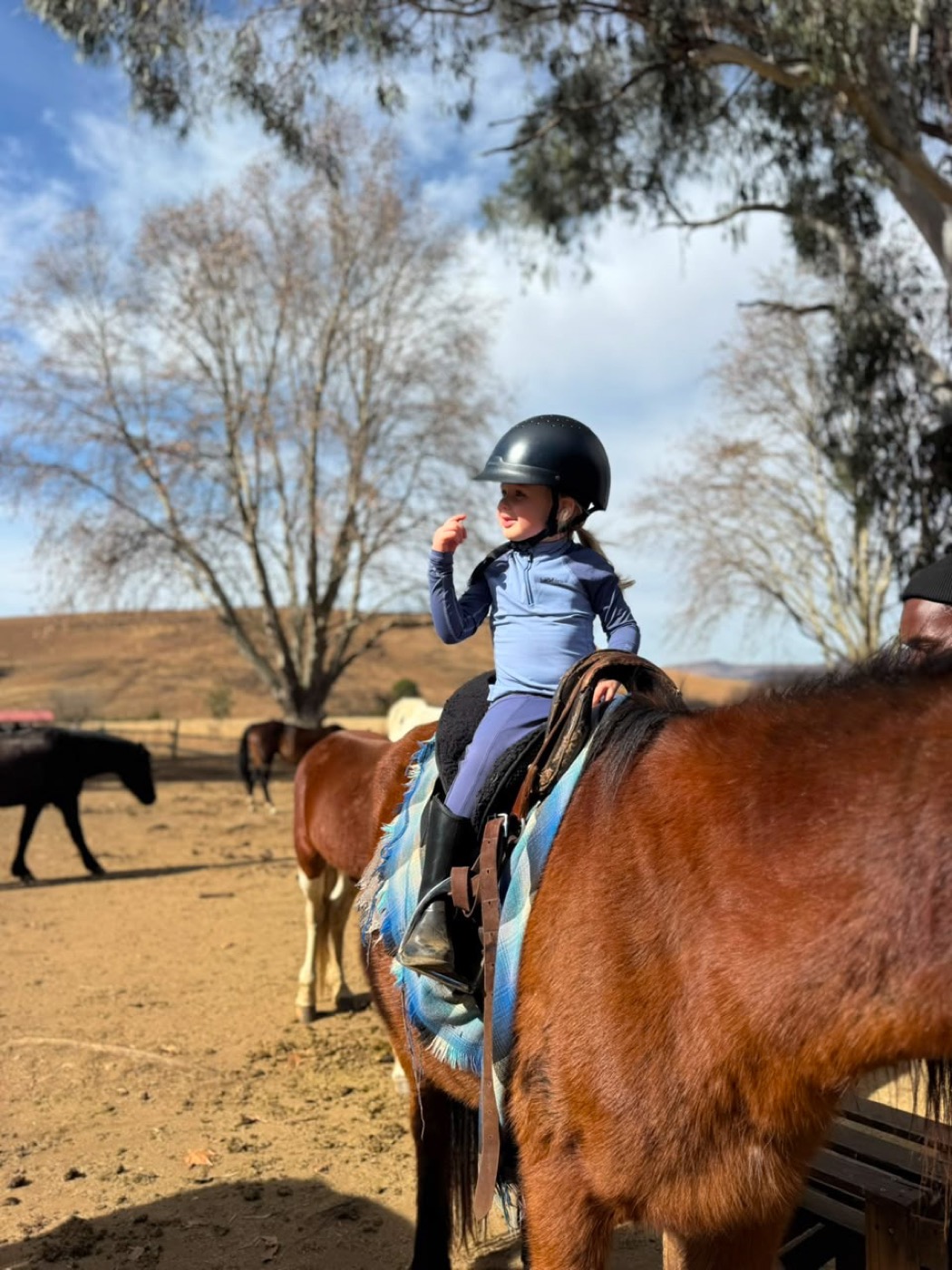 Little rider on horseback at Khotso, Underberg